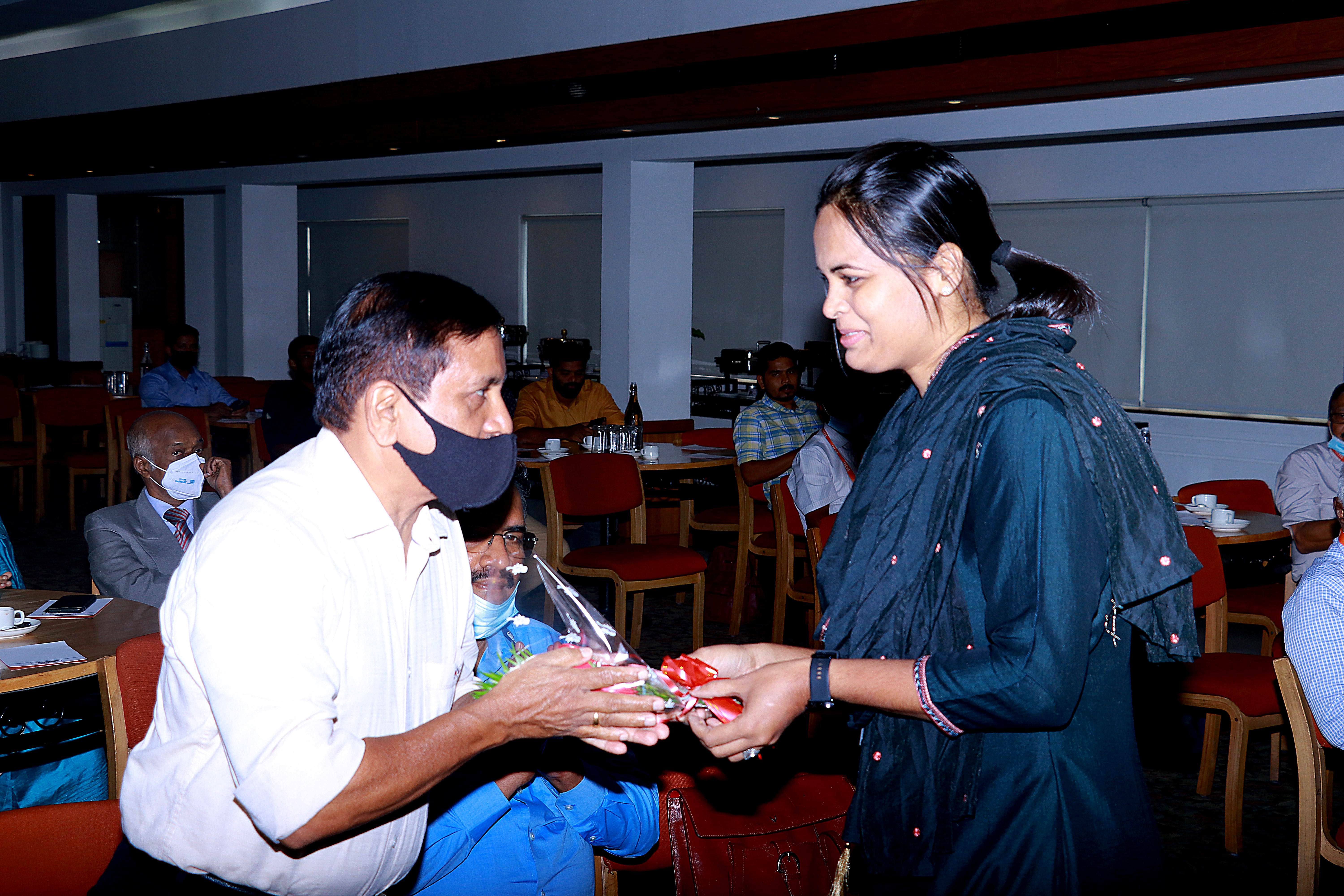 Receiving Guest of Honour Shri. A.P. RAMACHANDRAN (Rtd. Chief Manager SBI).